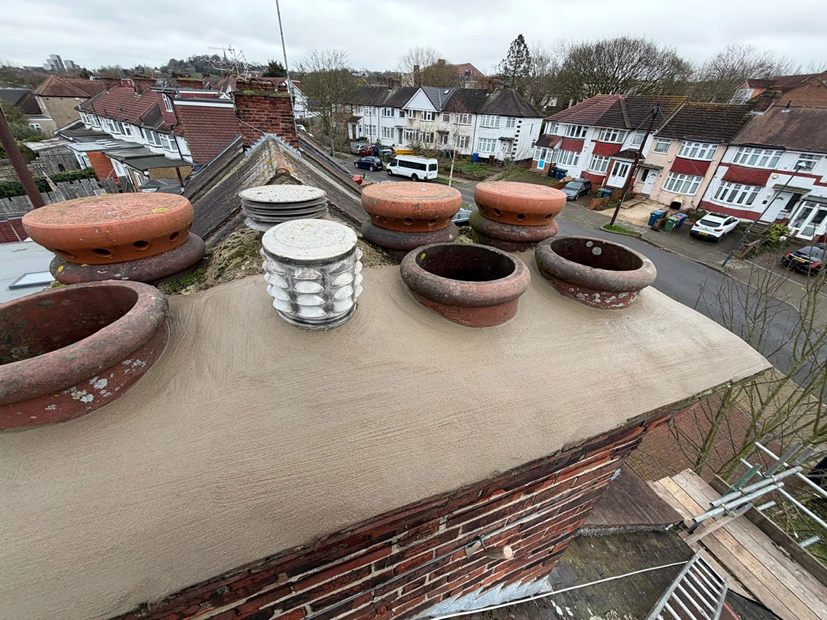 Drone image of chimney flaunching at high level carried out by Jakeman Roofing Ltd for property owner to view.