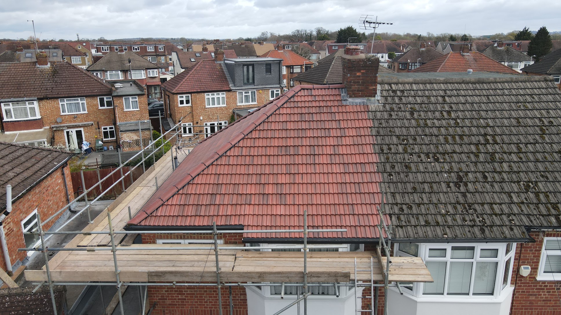 Completed re-roof in red roof tiles by Jakeman Roofing Ltd