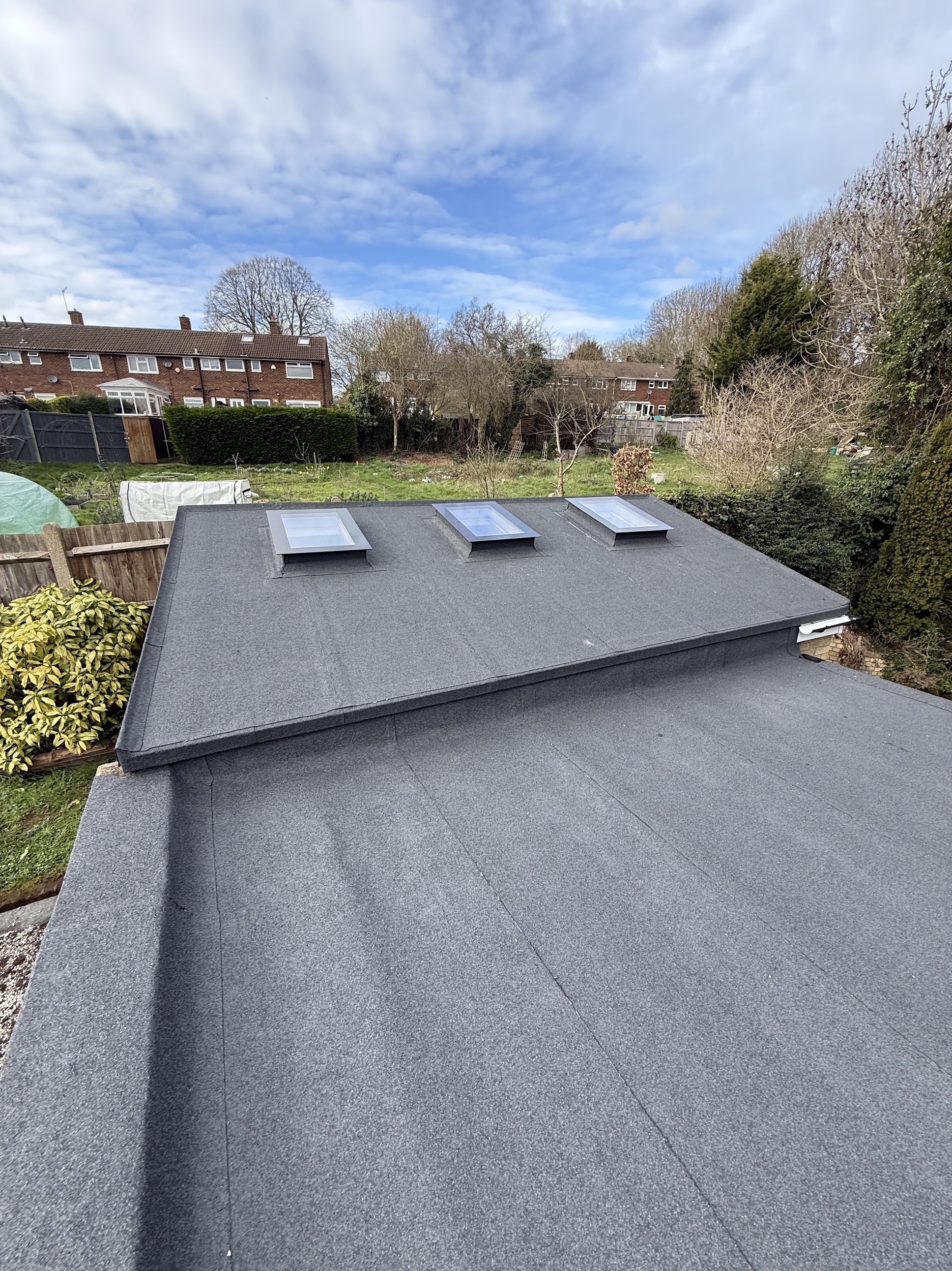 Flat felt re-roof with rooflights