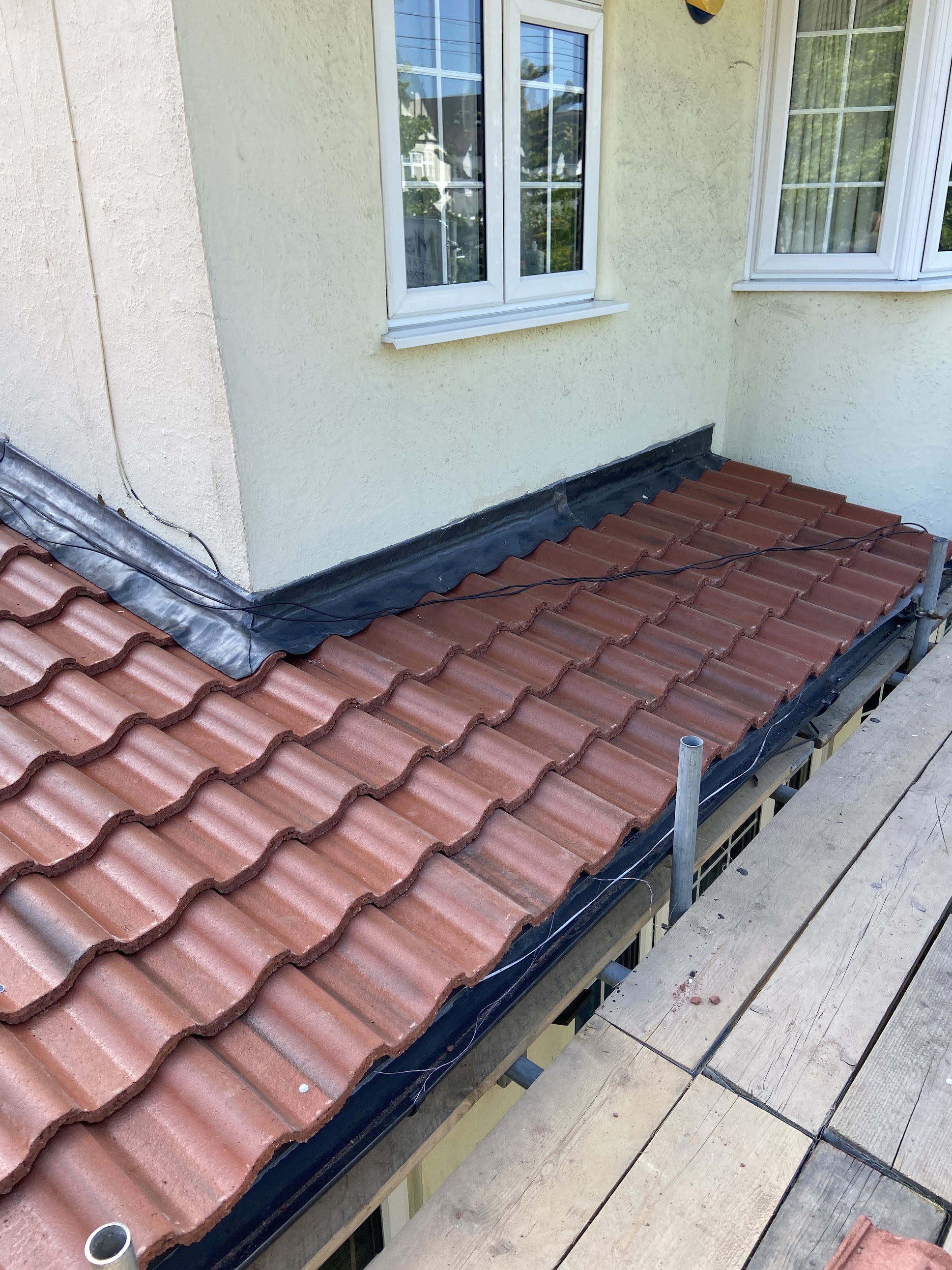 New roof tiles being installed in Ruislip