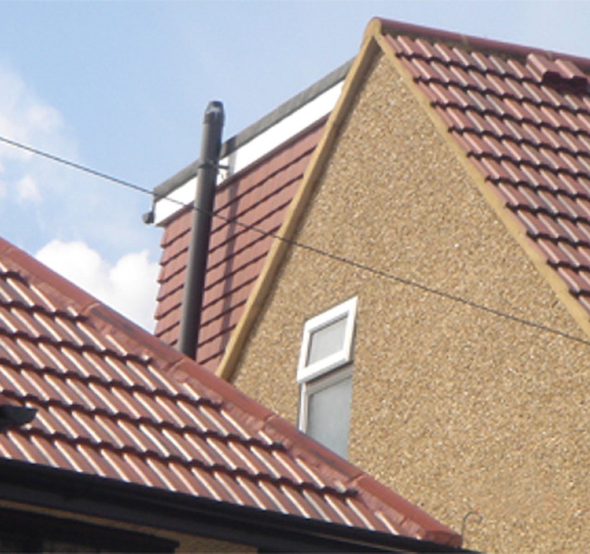 Completed tiled roof in Ruislip by Jakeman Roofing Ltd